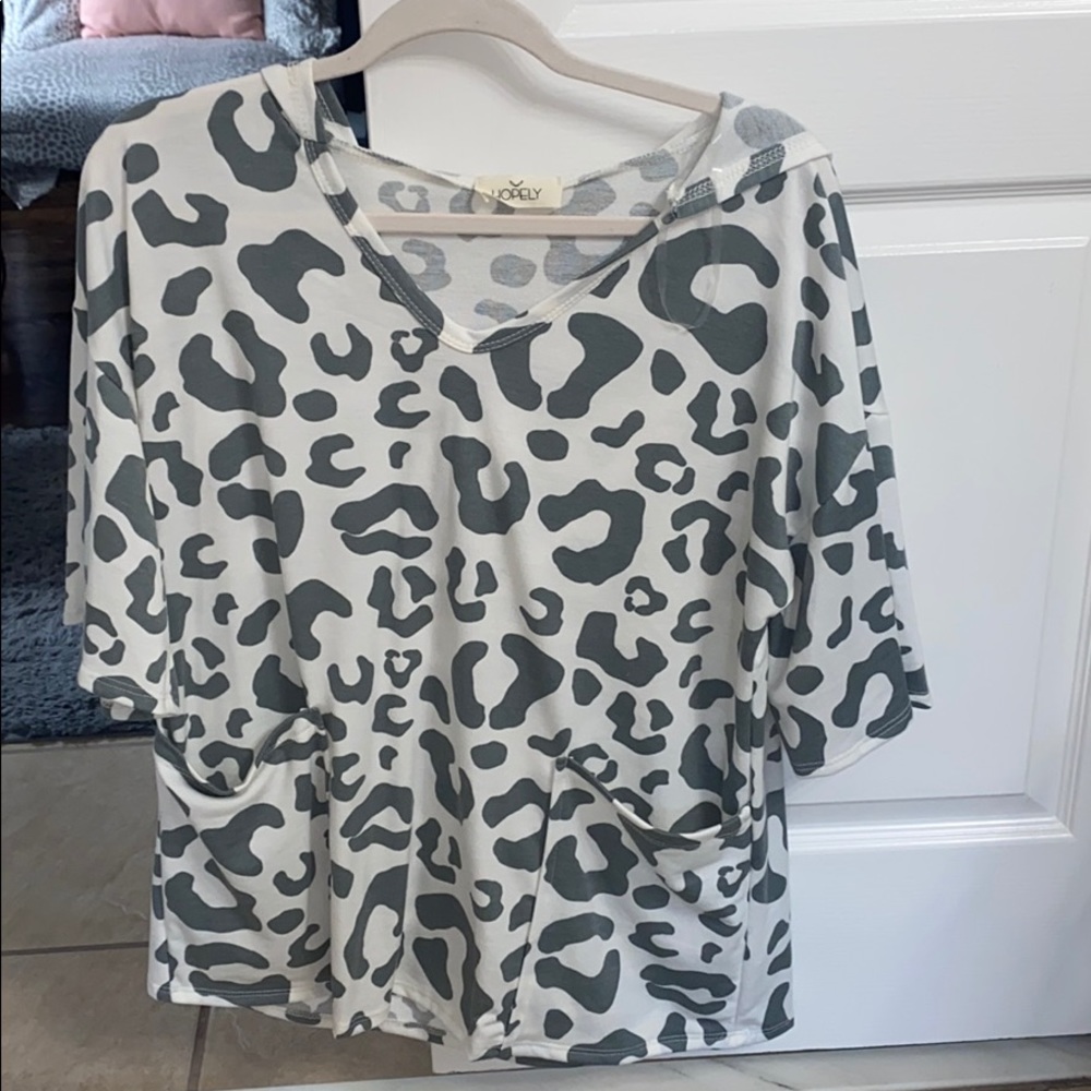 White and gray cheetah print shirt with hood